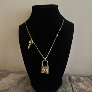 Lenora Dame Under Lock and Key Long Gold Tone Pendant Necklace